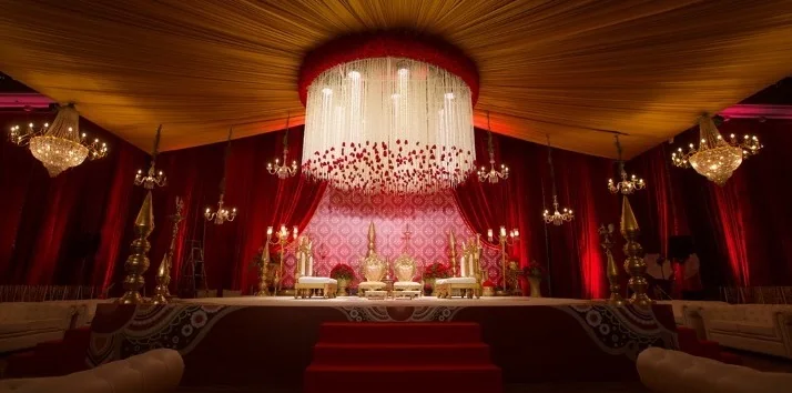 Crimson and crystal wedding reception stage