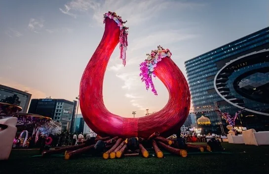 Floral swan sculpture at a wedding